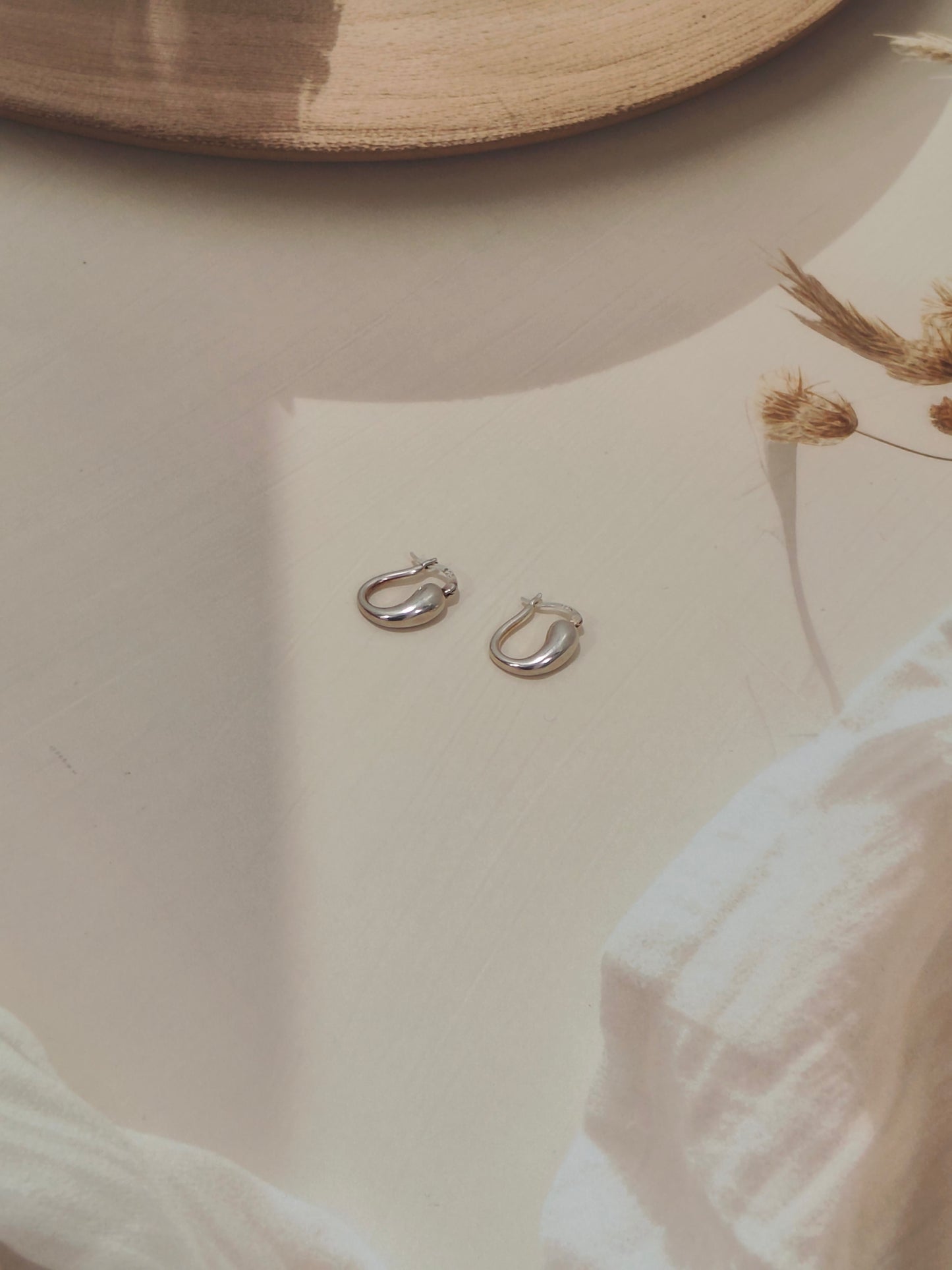 Glossy Teardrop Silver Hoop Earrings