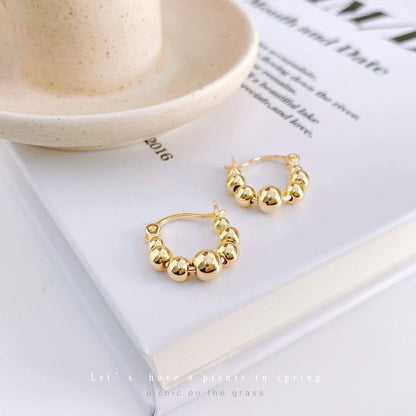 Charming Gold Beaded Hoop Earrings